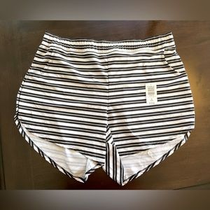 Torrid swim shorts and black tankini